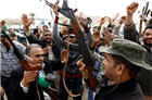 Правительственные войска Ливии, верные Муаммару Каддафи, захватили город Ма ...